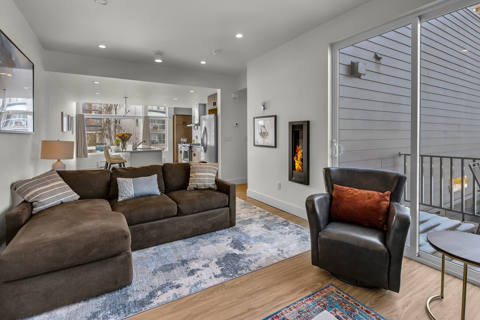 Living area with fireplace at Denali View Retreat, Anchorage